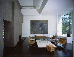 The brown barcelona chair in living room is looks so perfect, if you redecorating your living room, you can buy some brown. The Iconic Barcelona Chair Featured In 25 Stylish Interior Designs