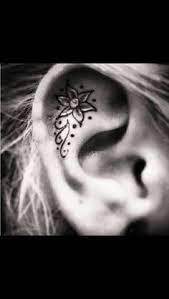Los 17 Tatuajes De Orejas Mas Creativos Que Le Daran Hambre A Mike Tyson Picture Tattoos Tattoos Inner Ear Tattoo
