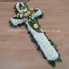 Below are some examples of funeral crosses avalible to purchase online or by contacting me using the contact me page. Funeral White Cross With Roses Tribute Derby Funeral Flowers Derby
