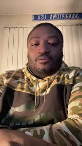 Guy with Fan in Backyard about Wild Fires