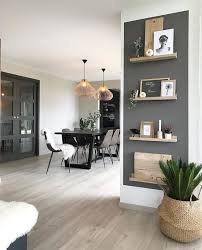 The White Color On The Wall Contrasts Wonderfully With The Dark Gray Of The Door In 2020 Apartment Living Room Living Room Scandinavian Living Room Decor Apartment