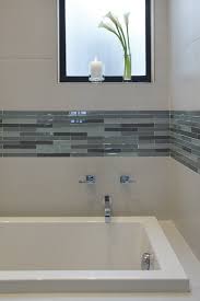 Just like white, grey tones can freshen any bathroom space. Krisproulx S Favorites Bathroom Tile Inspiration Bathroom Tile Designs Modern Bathroom Tile
