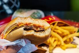 The basic hamburger at mcdonald's had one beef patty, one pickle, chopped onions, ketchup, mustard, and a toasted bun. Qsrs Celebrate National Cheeseburger Day Pymnts Com