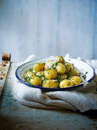 Best Jersey Royals With Butter And Herbs Recipe Delicious Magazine Recipe Recipes Herb Recipes Potato Recipes