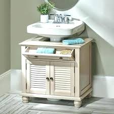 Fabric sink skirt if you don't have the room for the under sink pedestal cabinets, you can attach a quick sink skirt to hide your storage, this is another affordable option to utilize that wasted space under these. Pedestal Sink Cabinet Cool Storage House N Decor