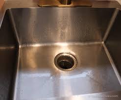 deep clean the kitchen sink and drain