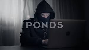Generally, both hackers and crackers are people who break in to computer systems. Hacker Cracker In The Hood In A Dark Roo Stock Video Pond5
