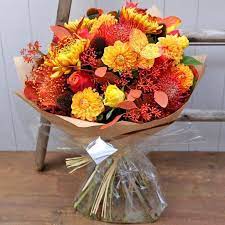 Fallen Leaves Tiger Lilies Florist Doncaster Fallen Leaves A Magnificent Display Of Deep Gold Red And Orange Blooms In Autumn Leaves Fall Flowers Tiger Lily