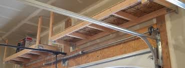 Install overhead diy garage shelving. Diy How To Build Suspended Garage Shelves Building Strong