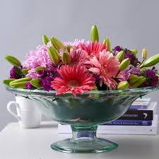 Colorful bell peppers are easily made into inventive vases, ready to hold a bright floral arrangement for your next picnic or autumn harvest table. Arranging Flowers In A Bowl