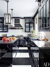 White kitchen cabinets and gray kitchen cabinets are the most popular to the customers. 9 Beautiful Black And White Kitchens From The Ad Archives Architectural Digest