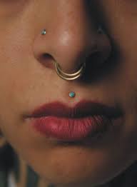 Medusa Piercing And Other Edgy Facial Jewelry Youll Want Asap Nose Piercing Jewelry Double Nose Piercing Nose Piercing