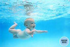 Nirvana's surviving members and the estate of kurt cobain have been sued by spencer elden, who appeared as a baby on the cover of 1991's nevermind. Nirvana S Infamous Nevermind Cover Shoot Like You Ve Never Seen Nirvana Nevermind Nirvana Scene Photo