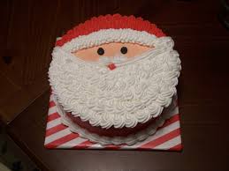 Woman cooking christmas cake on wooden. Christmas Cake Ideas Santa King Tumblr