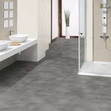Our wide selection of flooring solutions also includes laminate, tile, vinyl, and waterproof. Tarkett Id Inspiration Loose Lay Beton Grey Vinyl Tile Flooring Hamiltons Doors And Floors