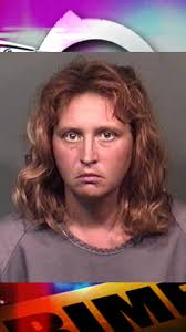 Woman gets life for killing other woman; using credit cards