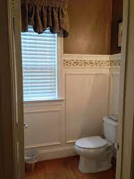Continue the tradition while updating the tile and style of the fixtures to create a bathroom that appeals on multiple levels. Powder Room Update Shadow Box Wainscoting And Tile Border Bathrooms Remodel Room Update Home