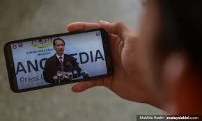 Malaysia's prime minister says a total coronavirus lockdown will be imposed in the country, with all business and economic activities to be halted for two weeks to contain a worsening outbreak. Malaysiakini As Govt Mulls Full Lockdown Moh Calls For Self Imposed Lockdown