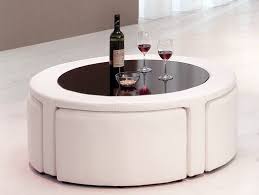 The golden leaf round coffee table represents a blend of modern style and superior craftsmanship. Coffee Table With Hidden Stools Coffee Table With Stools Trendy Coffee Table Round Ottoman Coffee Table