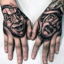 These masks are also ideal tattoo elements to showcase the japanese culture. Drama Masks Unique Hand Tattoo Ideas For Men Unique Hand Tattoos Hand Tattoos For Guys Hand Tattoos For Women