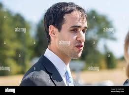 Scott Moskowitz, director of strategy and market intelligence for the  Hanwha Q Cells operation, speaks with members of the media during the grand  opening ceremony at Hanwha Q Cells solar manufacturing facility