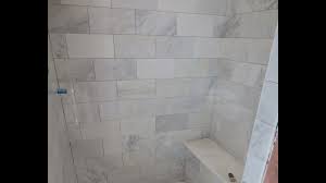 Tiling your shower ceiling here's how. Marble Carrara Tile Bathroom Part 3 Close Up Look Installing Carrera Marble Tile And Bench Seat Youtube