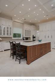 Luxury Two Toned White Kitchen With A Stained Wood Island Timeless Kitchen Kitchen Cabinets Makeover Wood Kitchen Island