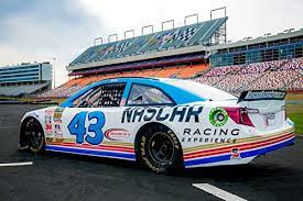 Waiting in the pit for my ride along meant getting to enjoy the sounds of nascars flying by every few minutes. Nascar Ride Along At Las Vegas Motor Speedway Thatsweetgift