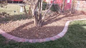 You might even have some bricks laying around your own yard! Brick Edging Omaha Landscaping