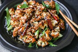 Slice the spring onions and diced the serve up your cauliflower rice stir fry alongside fish, chicken, and red meat dishes. General Tso S Cauliflower Baked The Wanderlust Kitchen