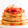 We add nonfat vanilla greek yogurt to whipped cream to lighten up the view image. 1