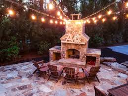 Hinged door makes it easy to stir up the logs. Outdoor Fire Pits Fireplaces Pros And Cons Outdoor Makeover