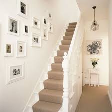 Don't just use the hallway as a place to dump your bag and shoes at the hallways often end up far down the list of decorating jobs and can end up looking lacklustre and this is a great idea in homes with only one living space, allowing one person to enjoy a good book in. Hallway Ideas To Steal Hallway Decorating White Staircase New Homes