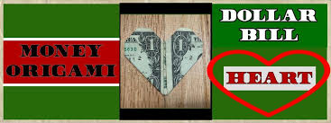 Next, fold the bottom corners up to the crease in the center of the dollar. Easy Dollar Bill Origami Heart 6 Steps The Daily Dabble