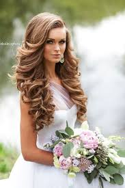 To emulate this long wedding hairstyle on your own, use a flatiron to curl hair away from the face. Long Curly Down Wedding Hairstyle Deer Pearl Flowers