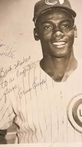 Dad passed and I found some memories. A signed Andre Dawson little league  ball from when we met him at Target, and Dad's signed pic of Ernie Banks  circa late 50s. : r/CHICubs