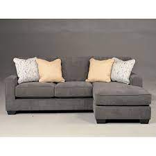 Low profile with thick shapely arms and a slim seat deck, its wide tailored cushions are made for sitting down and stretching out. With The Sleek Contemporary Look Of The Stylish Set Back Track Arms And Dark Finished Tapere Small Sectional Sofa Sofas For Small Spaces Ashley Furniture Sofas