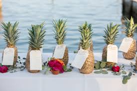 handwritten seating chart with gold pineapples seating