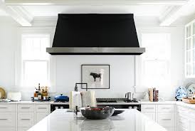 It can cover up to 6 square feet of cooking space and has an integrated plate to conceal the baffles. 15 Range Hood Design Ideas That Are Anything But Eyesores