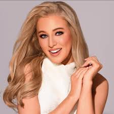 Who can embroider 15 shirts with a logo by Friday in Columbia?