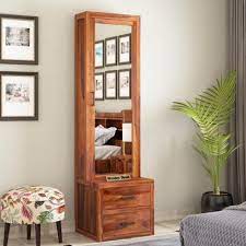 You also need to check the frame quality of the mirror and the clamps that are used to hang the mirror. Dressing Tables Upto 55 Off Buy Wooden Dressing Table Online In India Low Price
