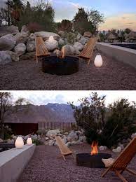 this renovated mid century modern ranch house is surrounded by mountains and desert backyard outdoor fire fire pit