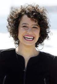 Loosely secure your curls with an elastic at the very top of your head, pull your hair forward, and let your curls hang freely over your face. Ilana Glazer 27 Frizzy Curly Hair Hairstyles For Receding Hairline Medium Curly Hair Styles