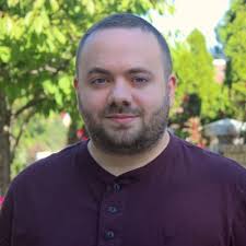 Wayne Travers Jr., M.A.