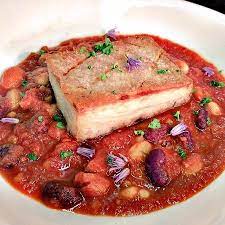 Even on chilly fall and winter nights, this white bean cassoulet with pork and lentils will warm you fold in pork, bacon, and thyme. Pork Belly With A Gubbeen Chorizo Cassoulet Picture Of Blairs Inn Blarney Tripadvisor