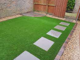 Paving Ideas For Your Artificial Lawn Design Paving Steppingstones Pavingslabs Artificialgrass Artificial Grass Backyard Artificial Lawn No Grass Backyard