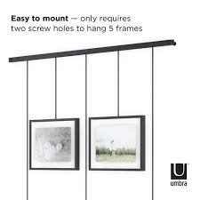 Exhibit Picture Frame Set Shop Modern Gallery Picture Frames Umbra Each brass wire frame floats the image between two pieces of glass. exhibit picture frame set shop modern