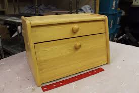 A breadbox is a simple wooden box with a door that allows you to store bread in a cool, dry place and keep it completely covered to keep bread fresher for longer. Handmade Vintage Wooden Bread Box