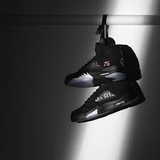 The shoe comes in primarily black and white as a gradient combination of purple and pink come together on the shoe. Presenting The Jordan X Psg Collection