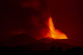 Photos show Mount Etna spewing hot lava into the air as Italian volcano  erupts again